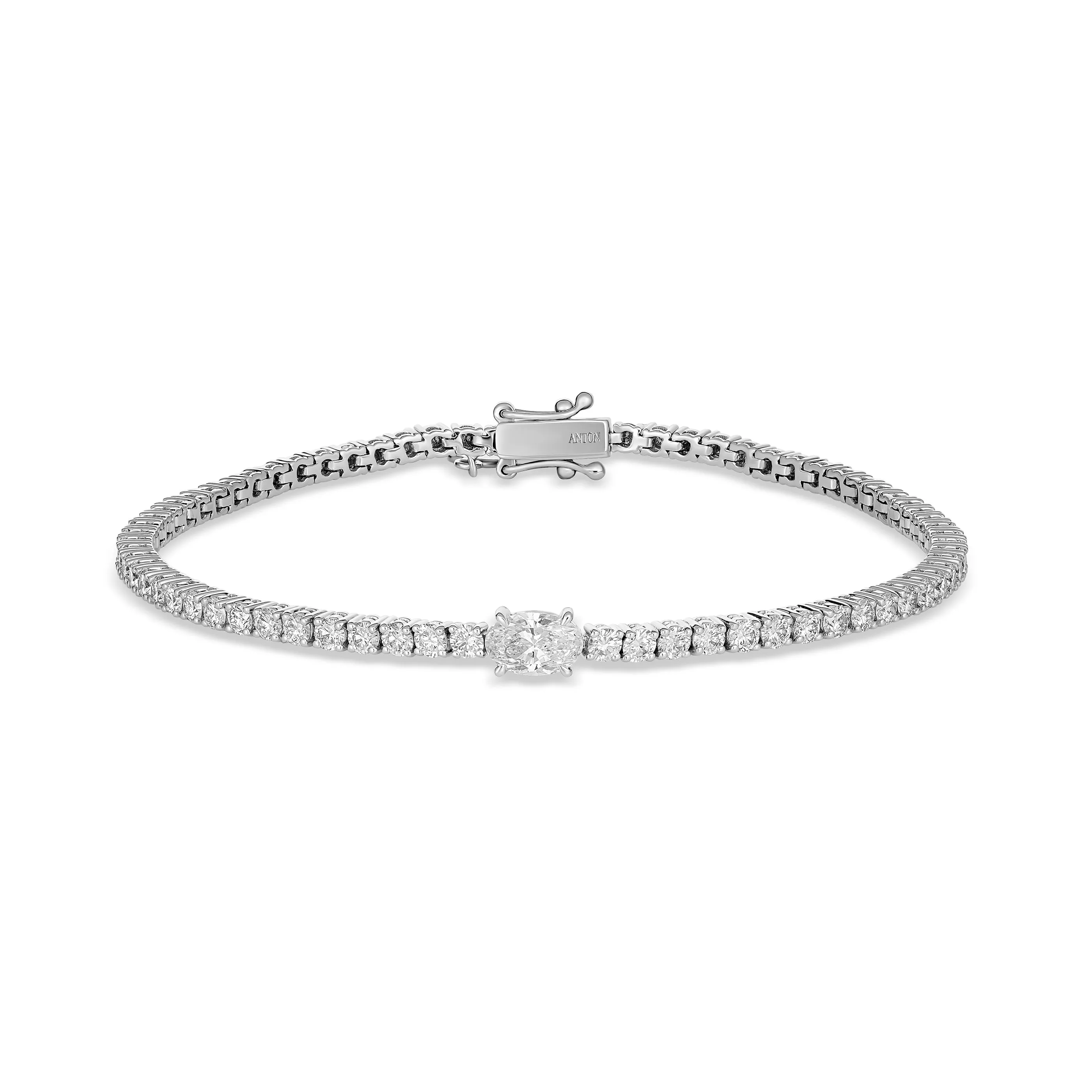 Classic Tennis Bracelet with Single Oval Cut Diamond | White Gold