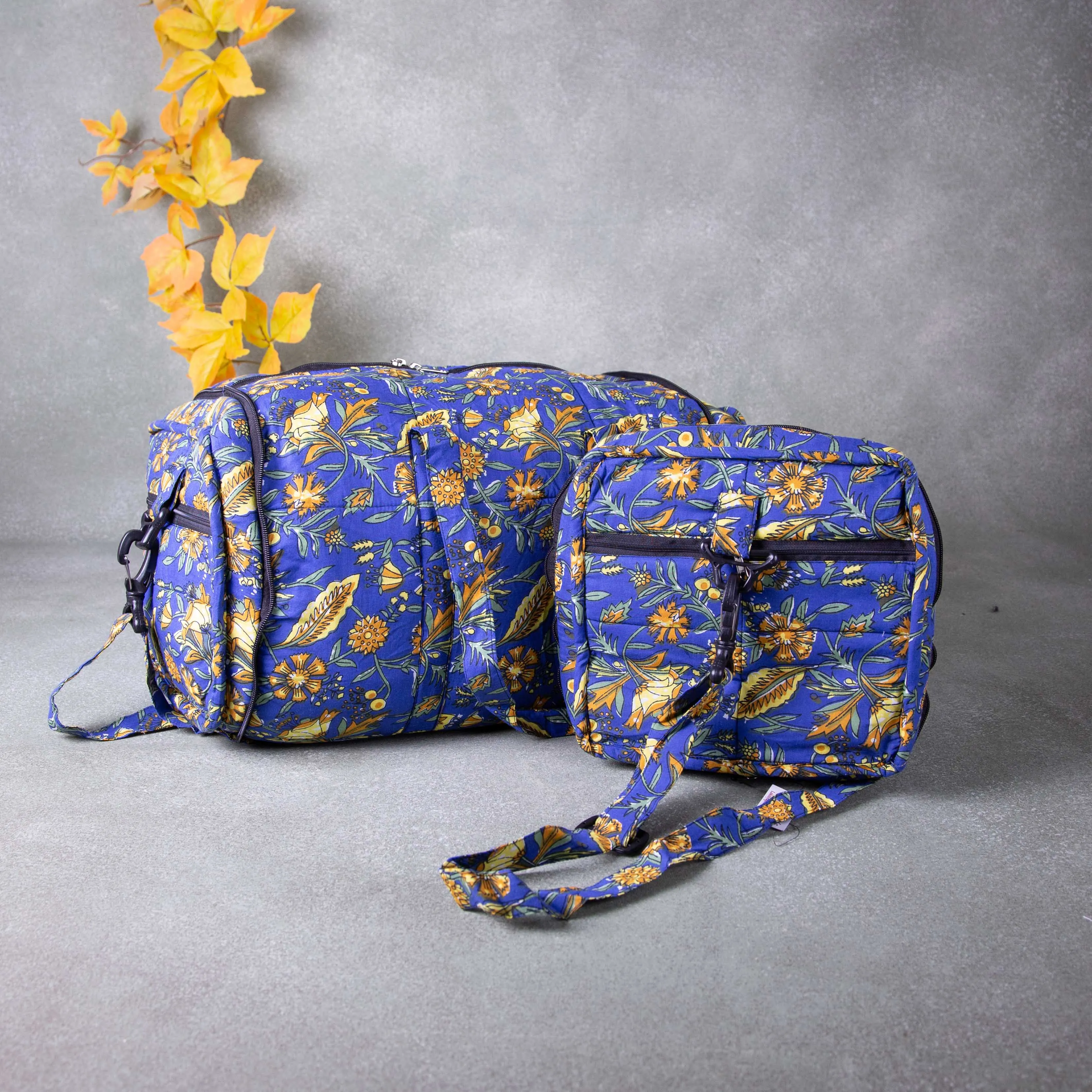 Expandable Travel Bag Mustered Blue Colour with Yellow and Orange Flower Design.