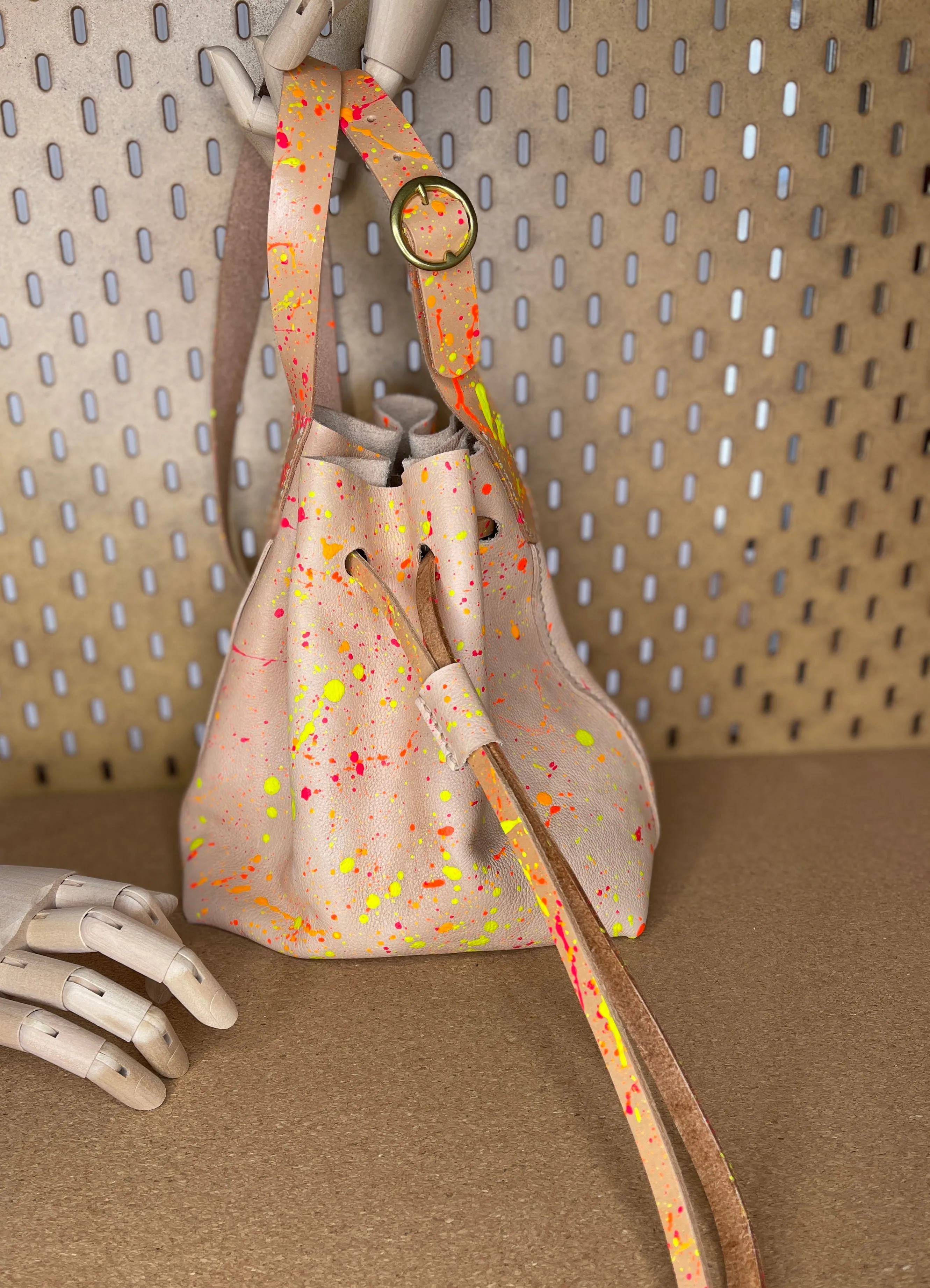 Neon Splatter Veg Tan Leather Drawstring Crossbody Bucket Bag