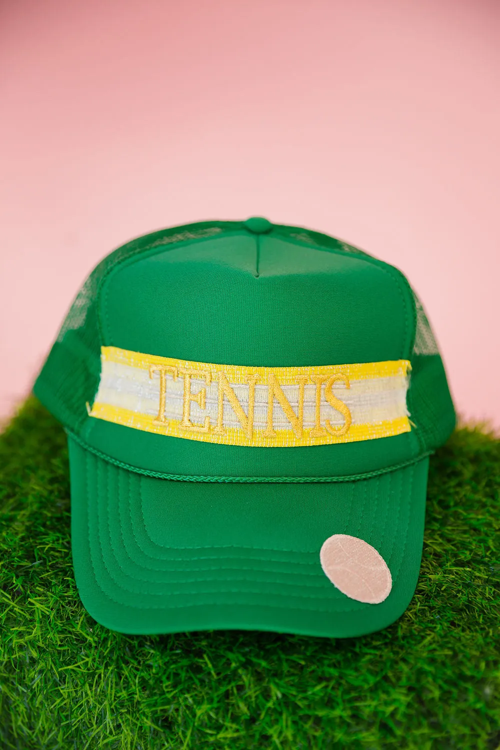 TENNIS RIBBON GREEN TRUCKER HAT